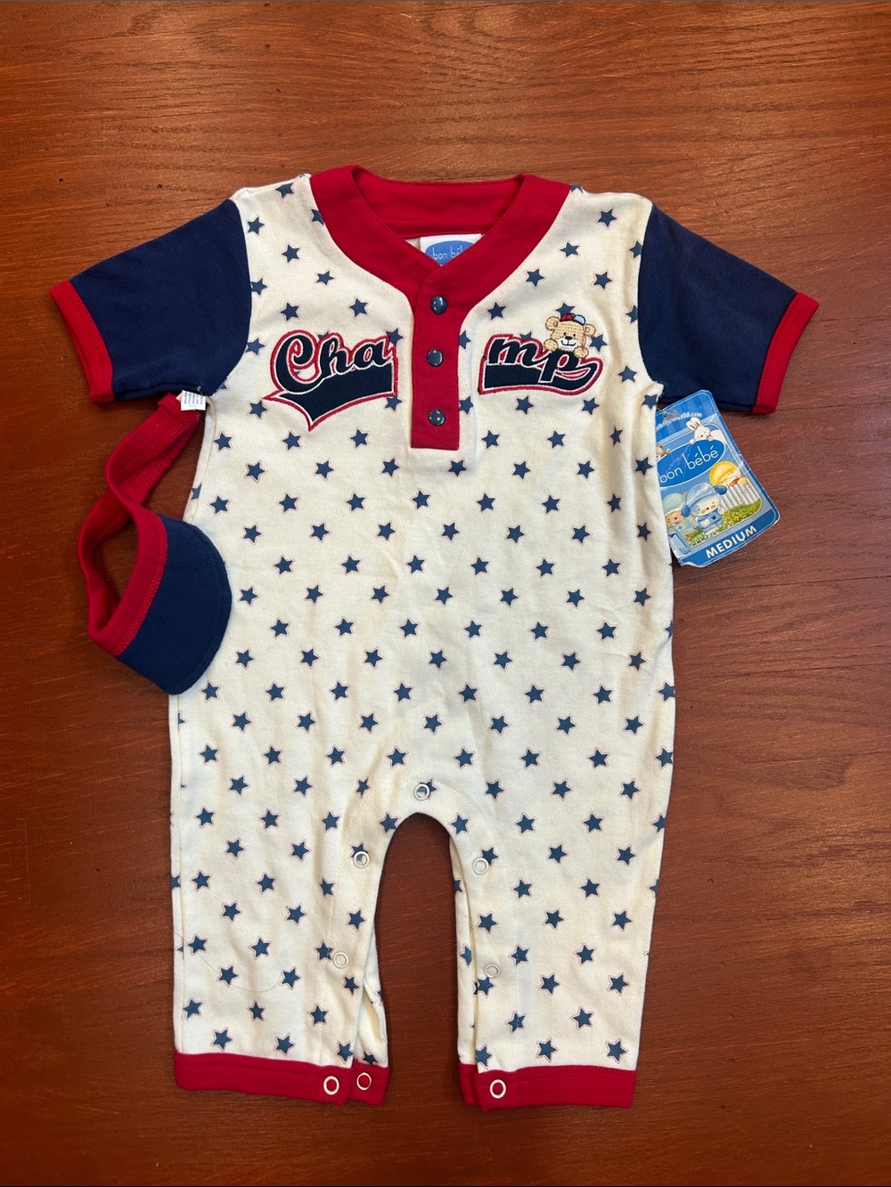 Bon Bebe Cream One-Piece with Navy Stars and Red Trim